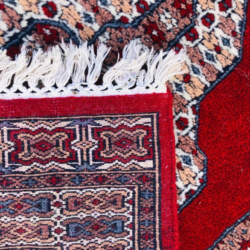 213 - Middle Eastern Persian Style Red Ground Rug.90cm x 160cm