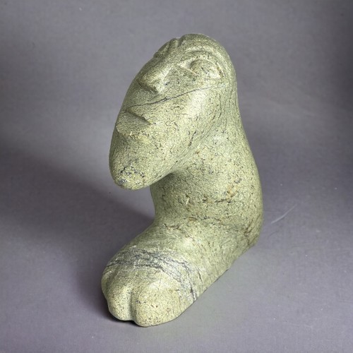 210 - A collection of stone sculptures. To include an Inuit sculpture, 20th century. Marked to base. Two S... 