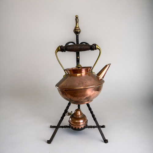 370 - A Victorian Copper & brass Spirit kettle.Attributed to Christopher Dresser. On Arts & Crafts... 