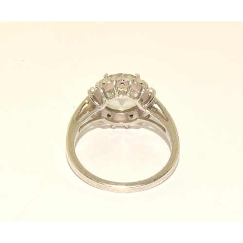 397 - 925 silver gemset ring in a halo design size R