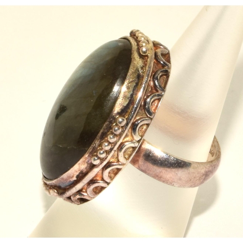 419 - 925 silver vintage Labordorite ring in a scroll design setting size M