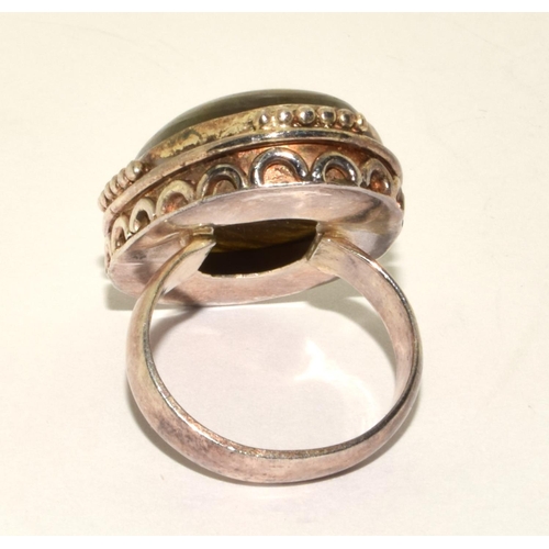 419 - 925 silver vintage Labordorite ring in a scroll design setting size M