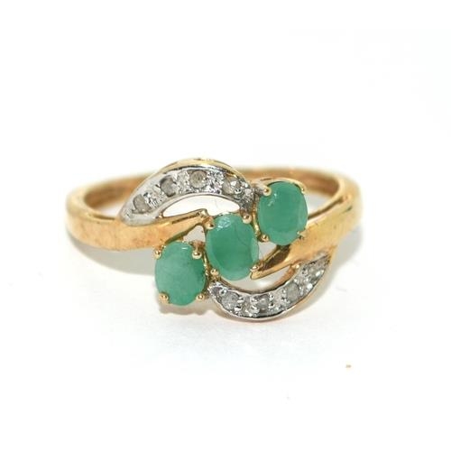 408 - 9ct gold ladies Diamond and Emerald sweep ring size N