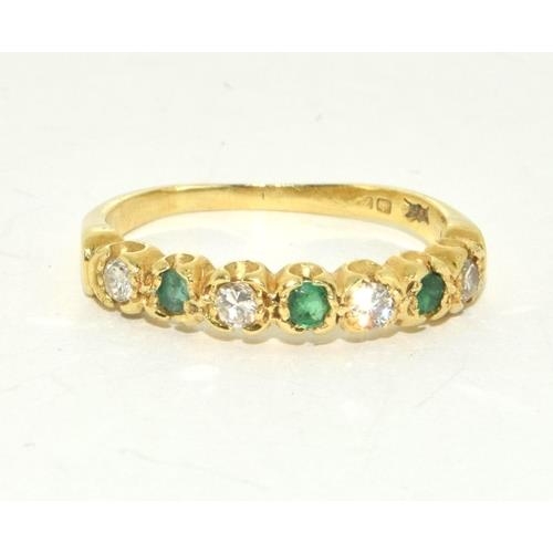 426 - Emerald and Diamond 1/2 eternity ring in 18ct gold ring Size O