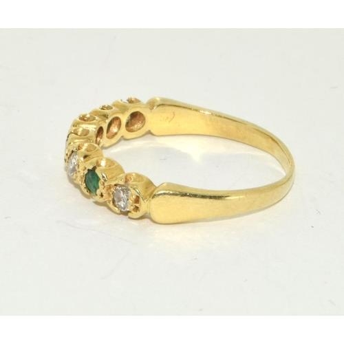 426 - Emerald and Diamond 1/2 eternity ring in 18ct gold ring Size O