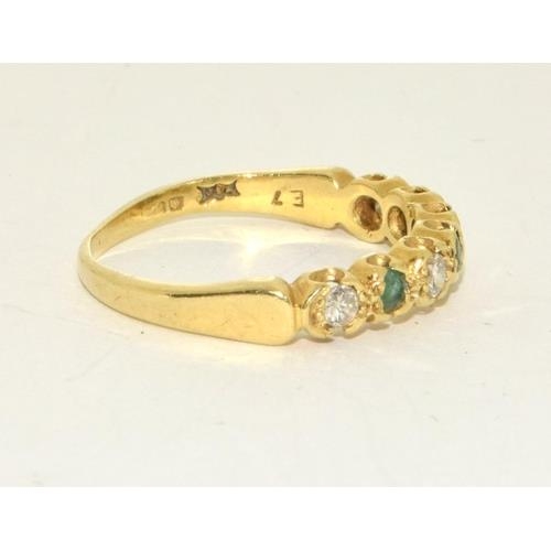 426 - Emerald and Diamond 1/2 eternity ring in 18ct gold ring Size O