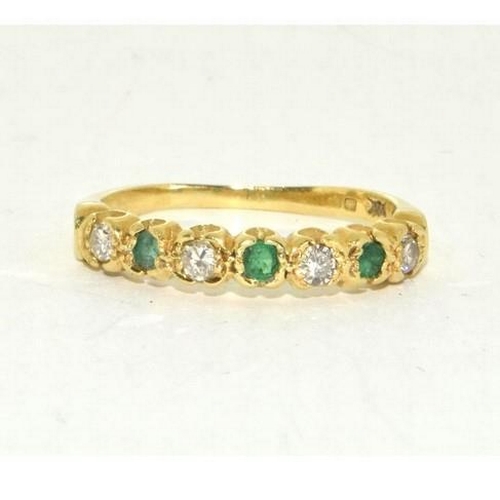 426 - Emerald and Diamond 1/2 eternity ring in 18ct gold ring Size O