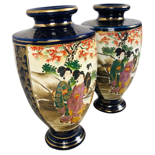 65 - Two Japanese Satsuma cobalt blue ground with geisha and landscape decoration Vases