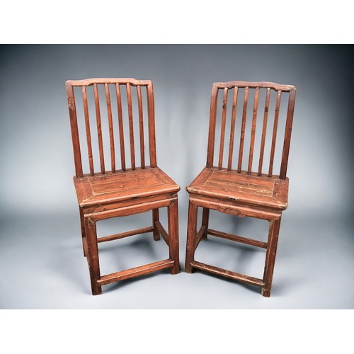 44 - A PAIR OF CHINESE CARVED PROVINCIAL CHAIRS. Late Qing dynasty. Probably Northern Provinces.