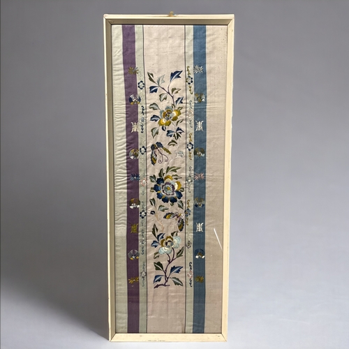 83 - A Chinese silk embroidered panel.
20th-Century.
Decorated with blossoming flowers & Butterflies.