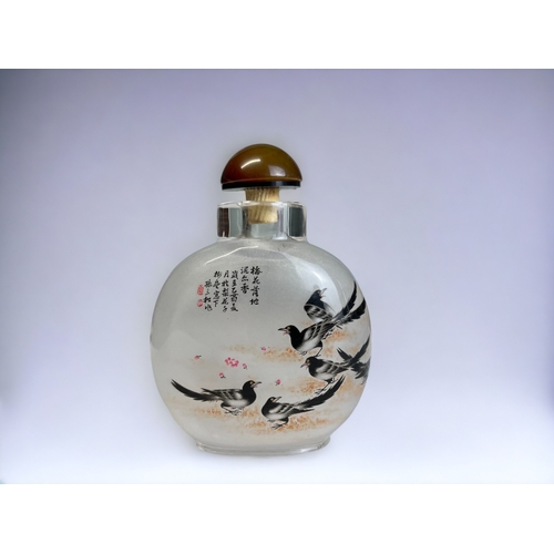 55 - A Chinese inside painted glass snuff bottle. Painted with birds. Signed Sun Jian Guo, with Poem.  Pr... 