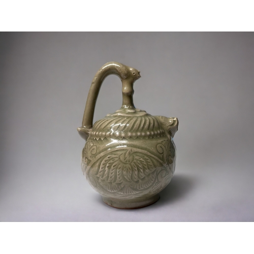 25 - A CHINESE YAOZHOU CELADON POT. Celadon glazed. Cadogan for so called 'mystery teapot'. In the Northe... 