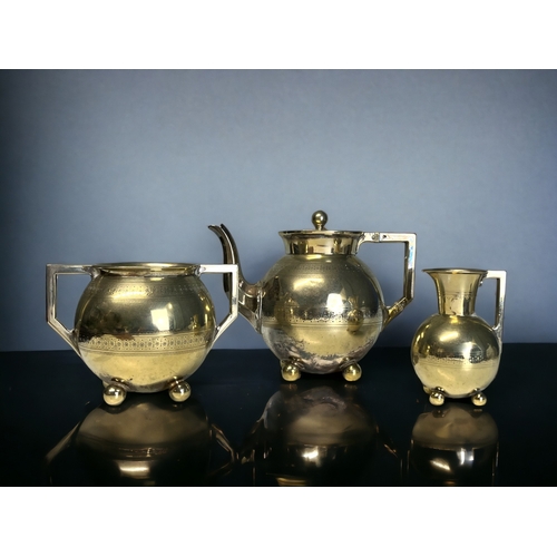 731 - A DR CHRISTOPHER DRESSER TEASET.
By Dixon & sons, circa 1882.
Model no. 2266
Gilded, with silver pla... 