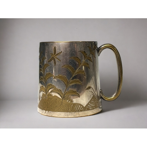 738 - A 19th century small tankard.
L. Stewart & Co, Calcutta, India.
Engraved design.
Height - 6.5cm