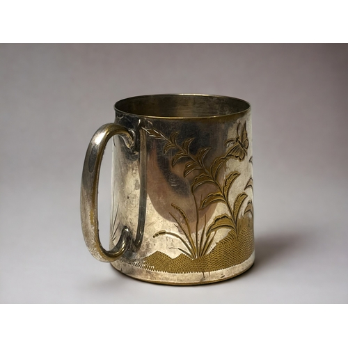 738 - A 19th century small tankard.
L. Stewart & Co, Calcutta, India.
Engraved design.
Height - 6.5cm