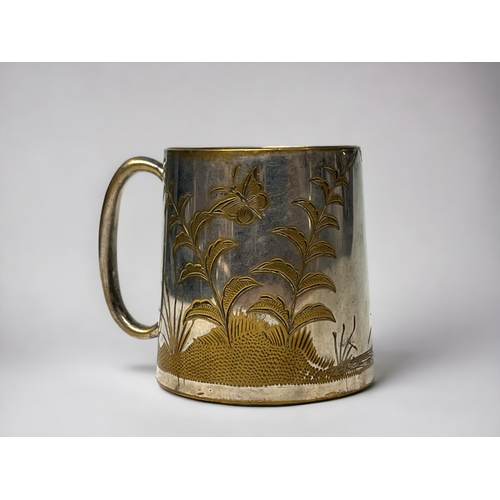 738 - A 19th century small tankard.
L. Stewart & Co, Calcutta, India.
Engraved design.
Height - 6.5cm