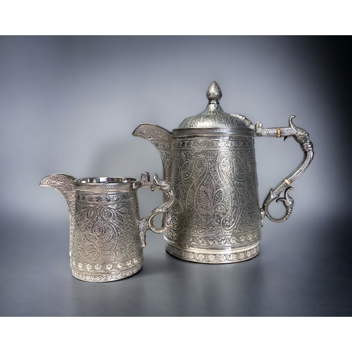 380 - A VICTORIAN SILVER PLATE KASHMIRI STYLE TEAPOT & MILK JUG. 
By Roberts & Belk, Circa 1875. 
Elborate... 