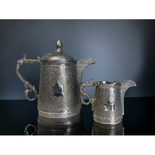 380 - A VICTORIAN SILVER PLATE KASHMIRI STYLE TEAPOT & MILK JUG. 
By Roberts & Belk, Circa 1875. 
Elborate... 