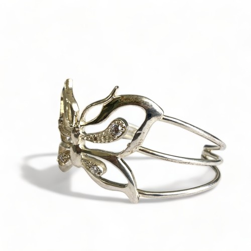 427 - A ladies sterling silver Butterfly bangle.