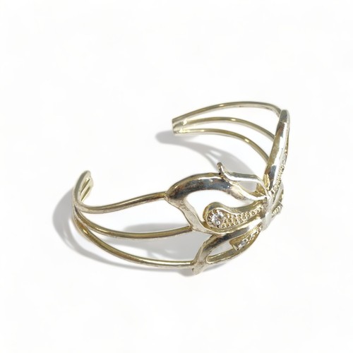 427 - A ladies sterling silver Butterfly bangle.