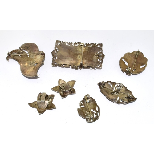 422 - Collection of Siamese silver brooches and earrings 