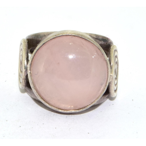 438 - 925 silver pink Chrystal ring with scroll setting to the shank size L 