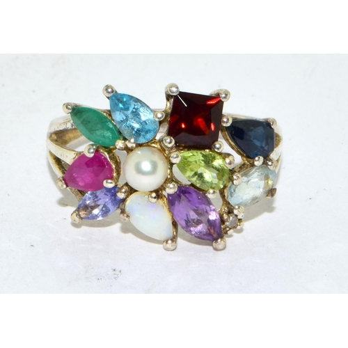 441 - 925 silver ladies multi Gem stone ring set with a central pearl size M