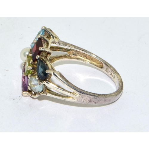 441 - 925 silver ladies multi Gem stone ring set with a central pearl size M