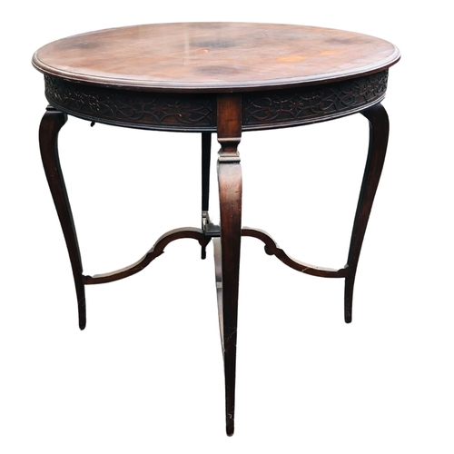 9 - Round Occasional Table on 4 cabriole shaped legs with decorative x stretcher.  Diameter 77cm x heigh... 