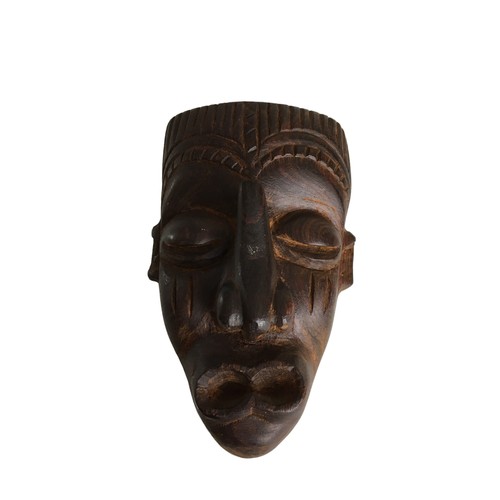 308 - Two African Tribal Masks Small. Wall hanging Souvenir Pieces, nicely carved.Each 15cm approximately ... 