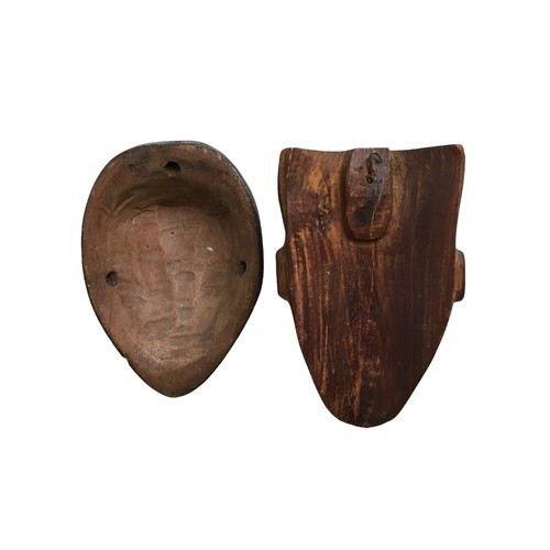 308 - Two African Tribal Masks Small. Wall hanging Souvenir Pieces, nicely carved.Each 15cm approximately ... 