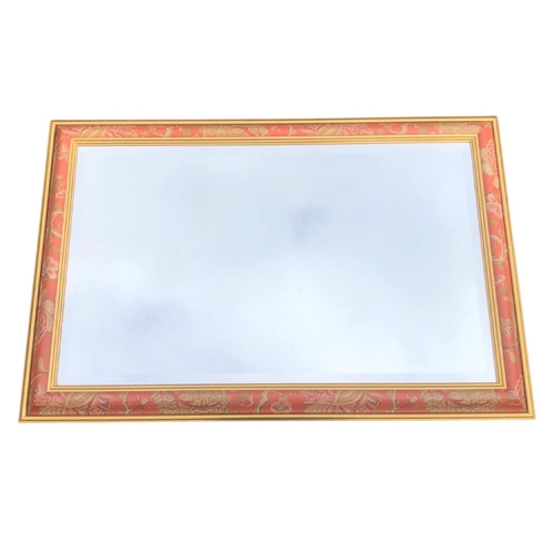 296 - Rectangular Mirror with Decorative Pink Surround and Bevel Edge Plate  overall size approx 103 x 68c... 