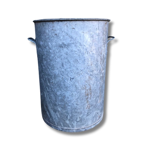 322 - Galvanised Bin with Handles
Height 63cm
Diameter 45cm