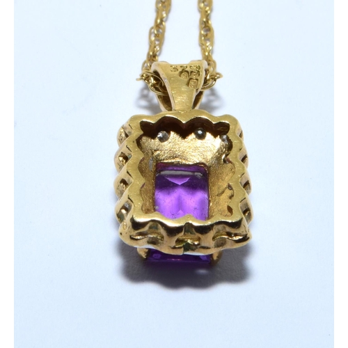 266 - 9ct gold Diamond and Amethyst pendant on a 9ct gold chain of 41cm long