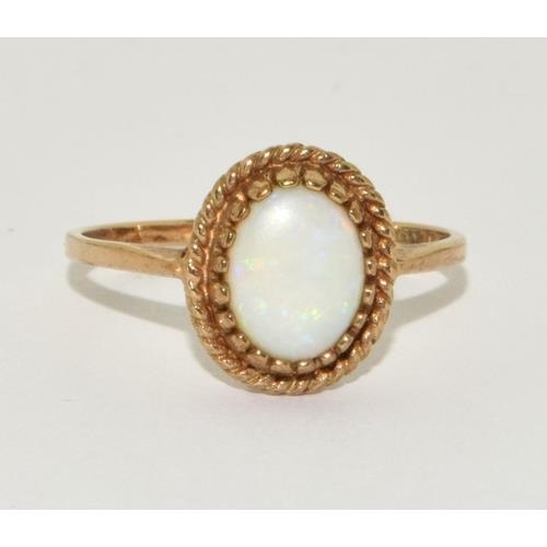 271 - 9ct gold ladies Opal ring in a vintage setting size R