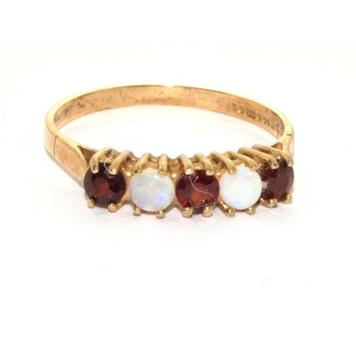 272 - 9ct gold ladies antique set Opal and garnet ring size R