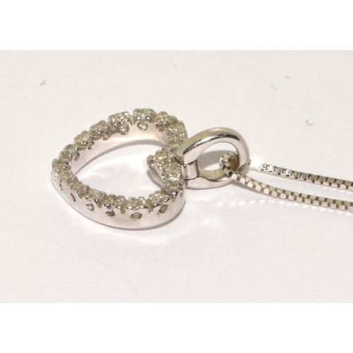 277 - 9ct white gold Diamond heart pendant on a 40 cm box chain