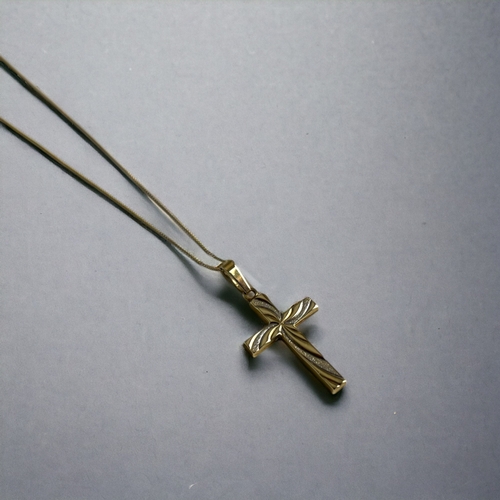 217 - A 9ct Gold cross pendant necklace.Stamped 375 to bail and chain. 32mm length  approx 1.51g... 