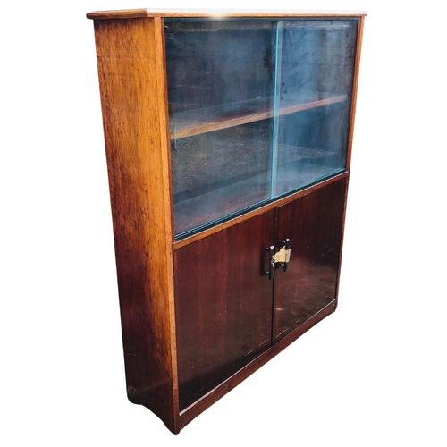 2 - Mid Century Cabinet/Bookcase with glass sliding doors. With tortoiseshell style Bakelite handlesH 12... 