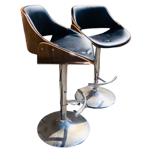 12 - Pair of Stylish Bar Stool Swivel Chairs in the Charles Eames Style.