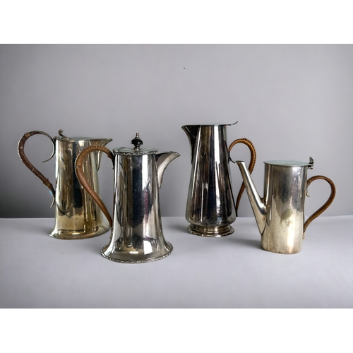 740 - A collection of four Christopher Dresser style tea & chocolate pots.Bamboo bound handles. Exampl... 