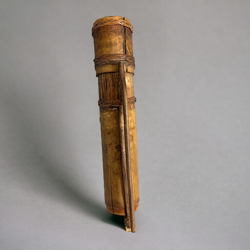 525 - A bamboo Iban blowpipe dart quiver, complete with a wooden hanging hook. The lid secured with plaite... 