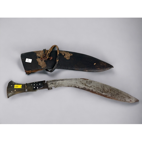 526 - An ornamental Khukri, 1970s/80s, with a leather sheath.missing the sharpening knife and the skinning... 