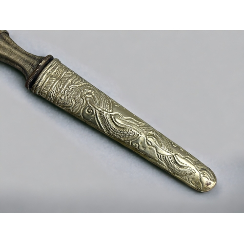 527 - An ornamental Malayan knife with an 8 inch triangular section blade, metal handle on bone, with a wh... 