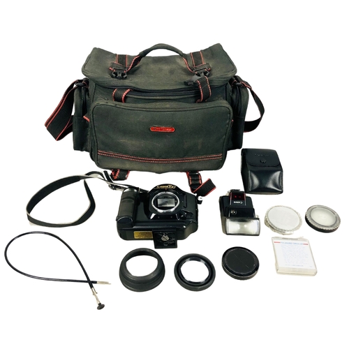 41 - Vintage camera equipment and bag to include Cannon T90 Camera and flash units