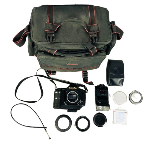 41 - Vintage camera equipment and bag to include Cannon T90 Camera and flash units