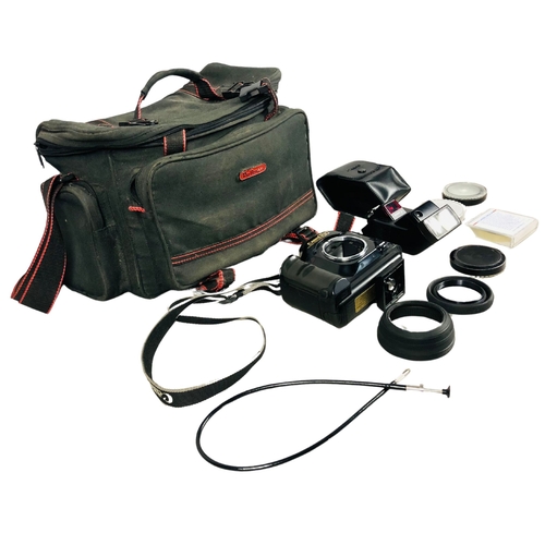 41 - Vintage camera equipment and bag to include Cannon T90 Camera and flash units