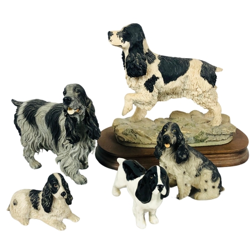 65 - Collection of model spaniels to include Beswick