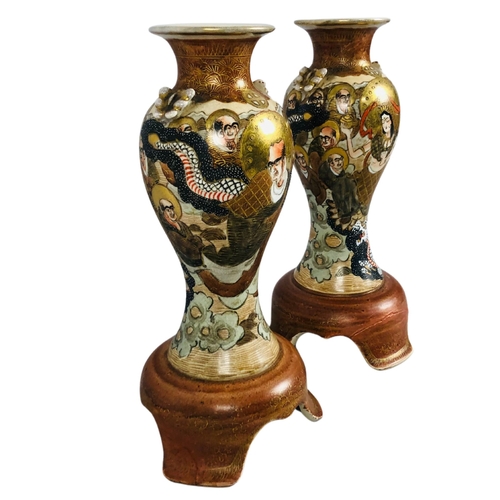 68 - Two Satsuma Vases with dragons and immortals. Late 19th/Early 20thC Approx Height 27cm