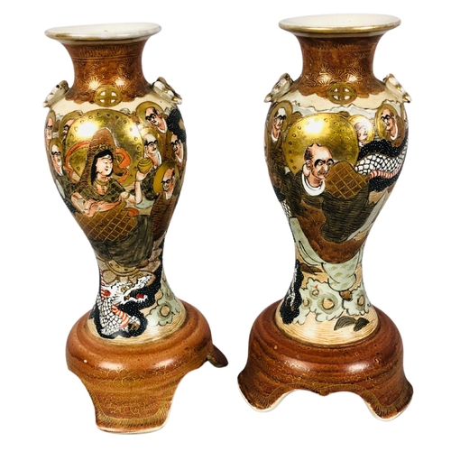 68 - Two Satsuma Vases with dragons and immortals. Late 19th/Early 20thC Approx Height 27cm